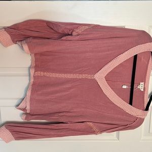 Women’s POL shirt size small.